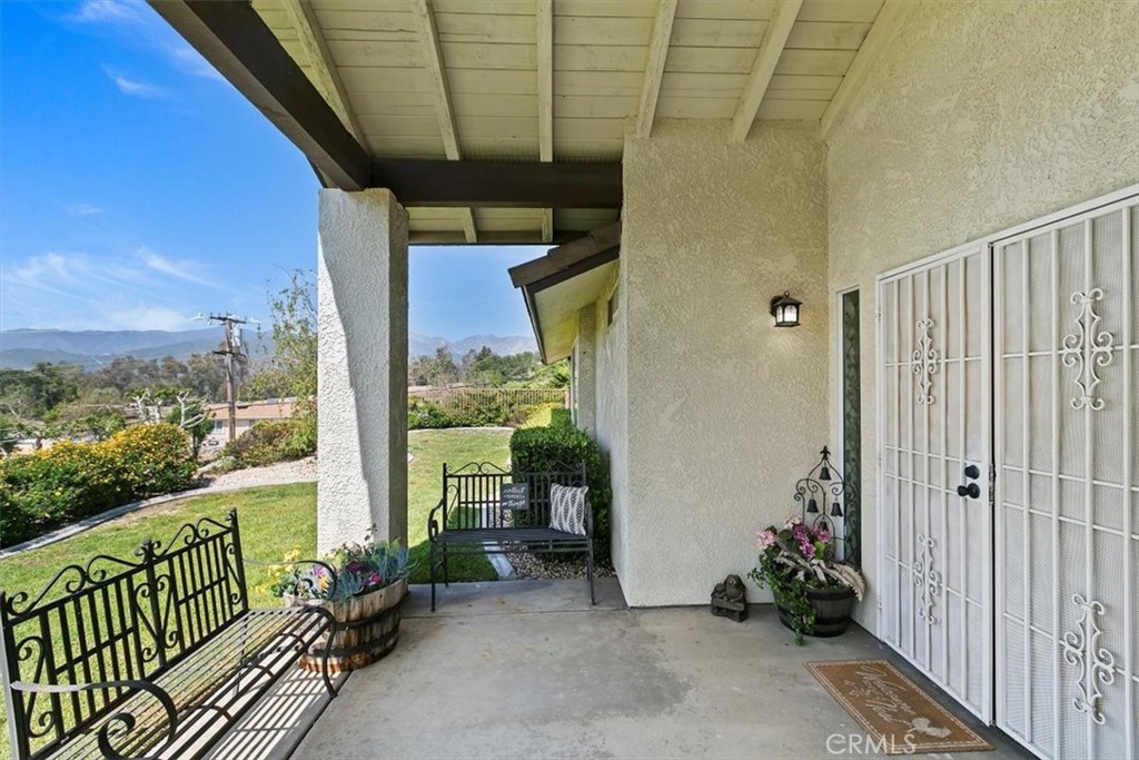 923 Devore Road San Bernardino, CA 92407 - Photo 10 of 75 a view of a porch with furniture