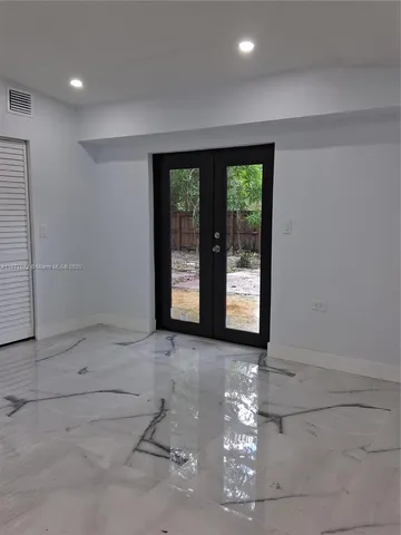 an empty room with windows