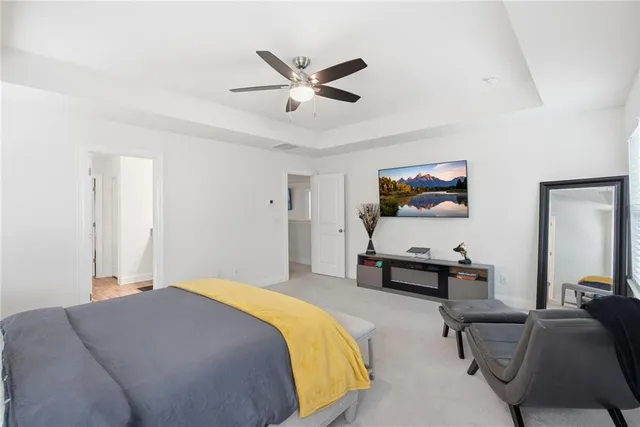 a bedroom with a bed and furniture