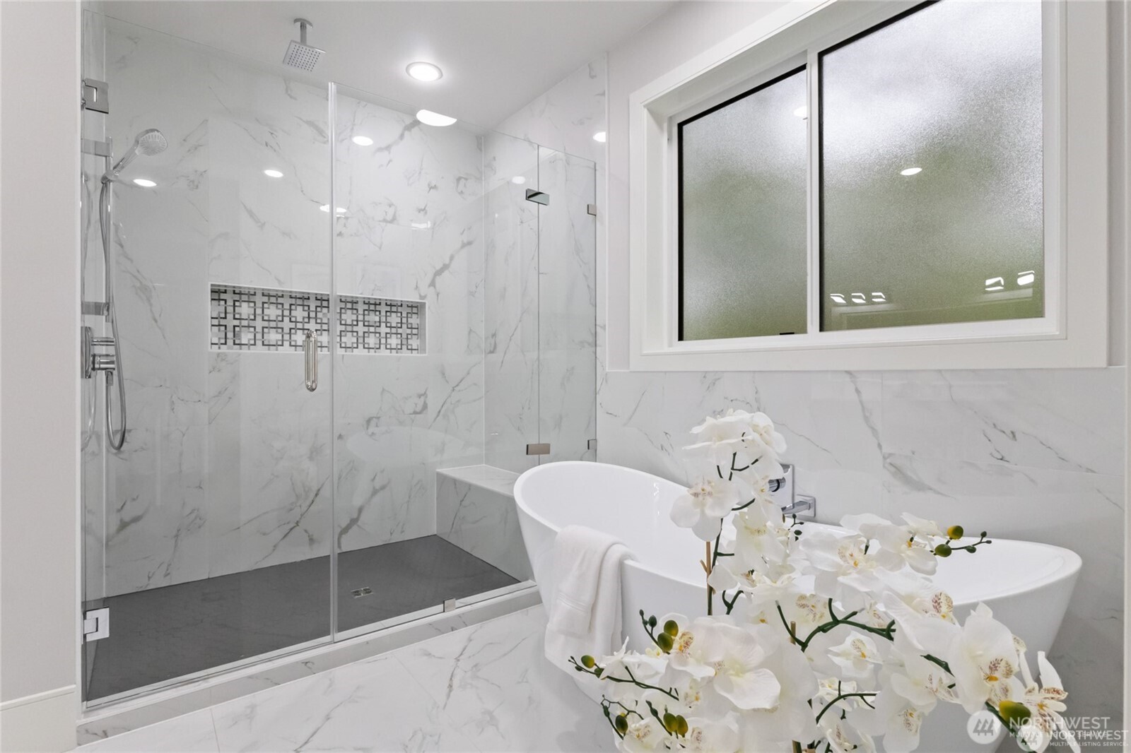 4413 Northeast 26th Court Renton, WA 98059 - Photo 14 of 28 a bathroom with a bathtub sink and toilet