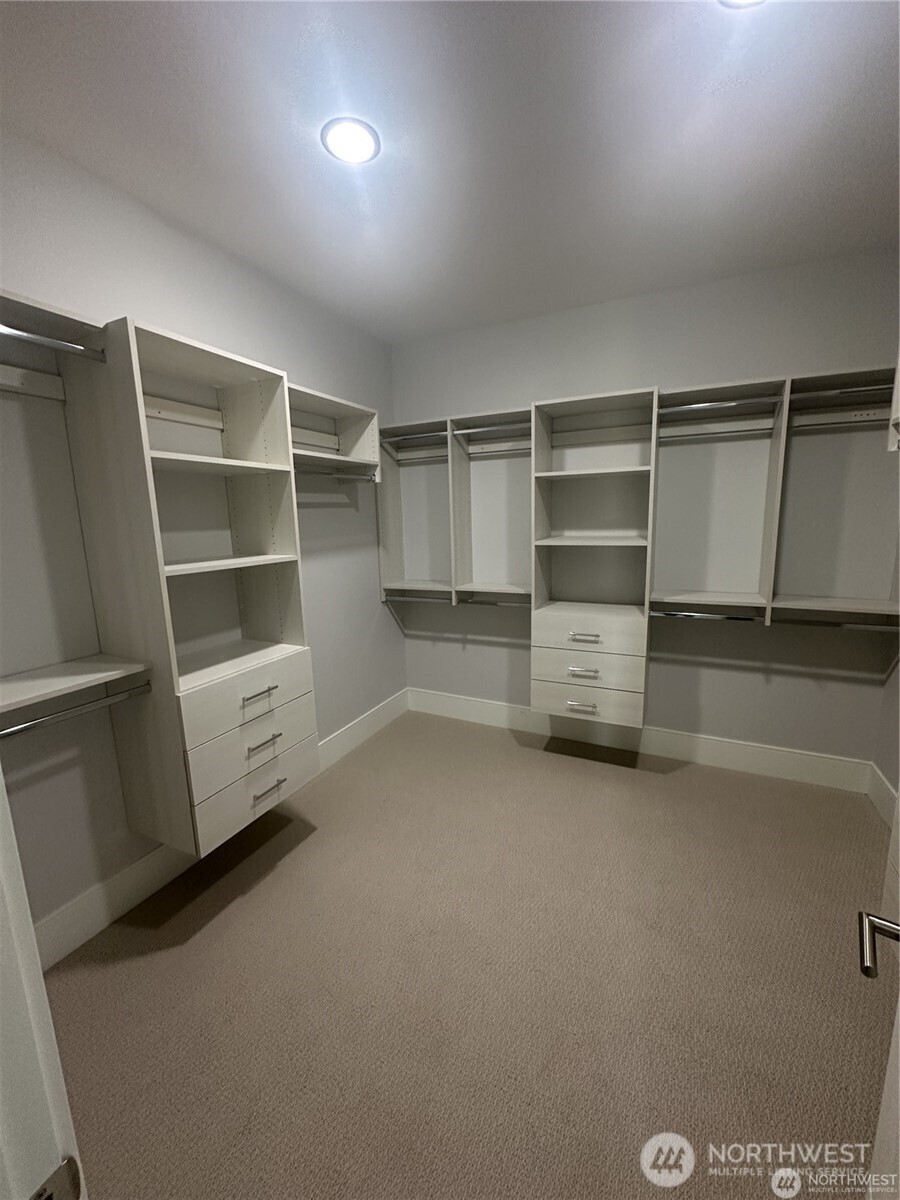 4413 Northeast 26th Court Renton, WA 98059 - Photo 16 of 28 a view of an empty walk in closet