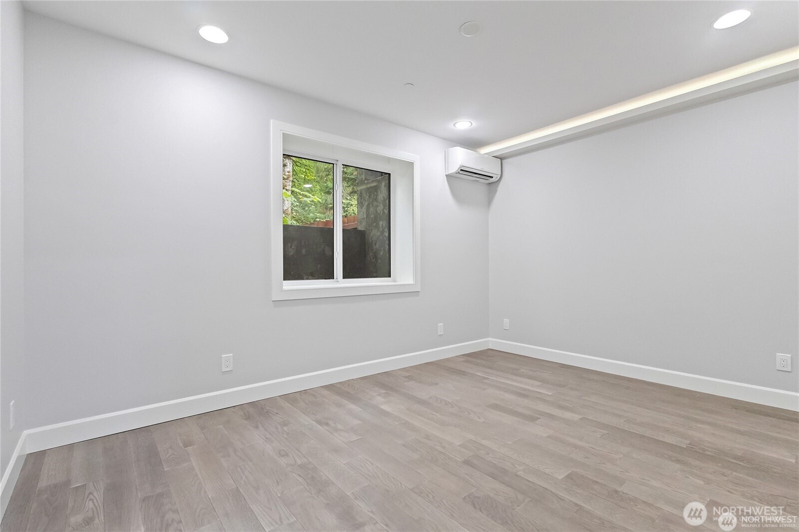 4413 Northeast 26th Court Renton, WA 98059 - Photo 26 of 28 a view of an empty room with a window