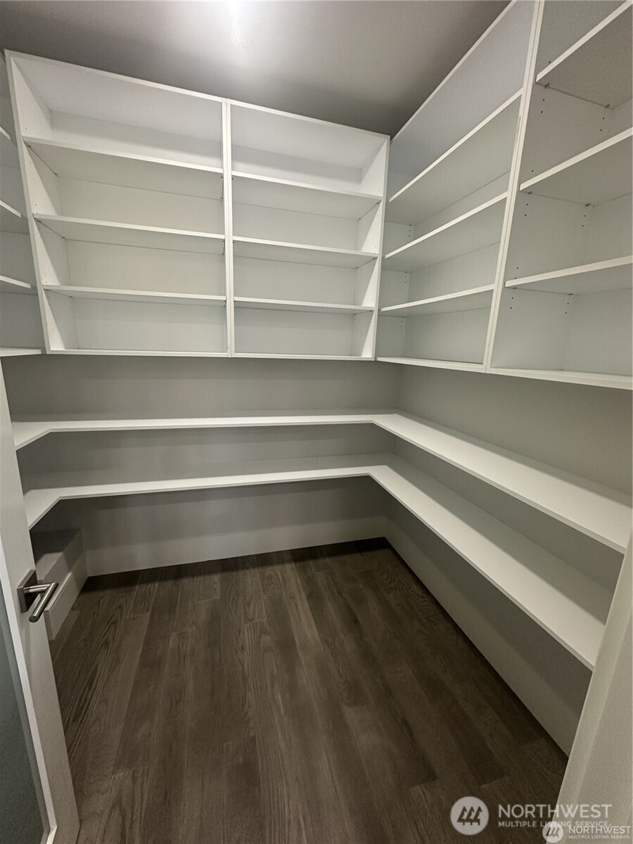 4413 Northeast 26th Court Renton, WA 98059 - Photo 8 of 28 a view of walk in closet with empty racks