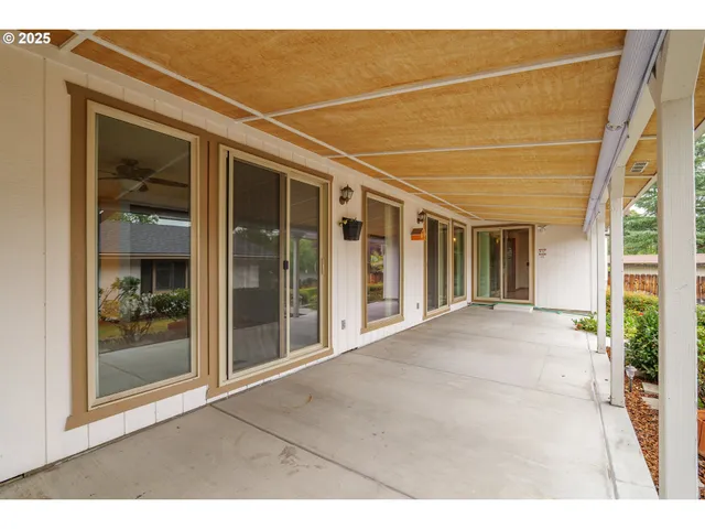 a view of house with yard