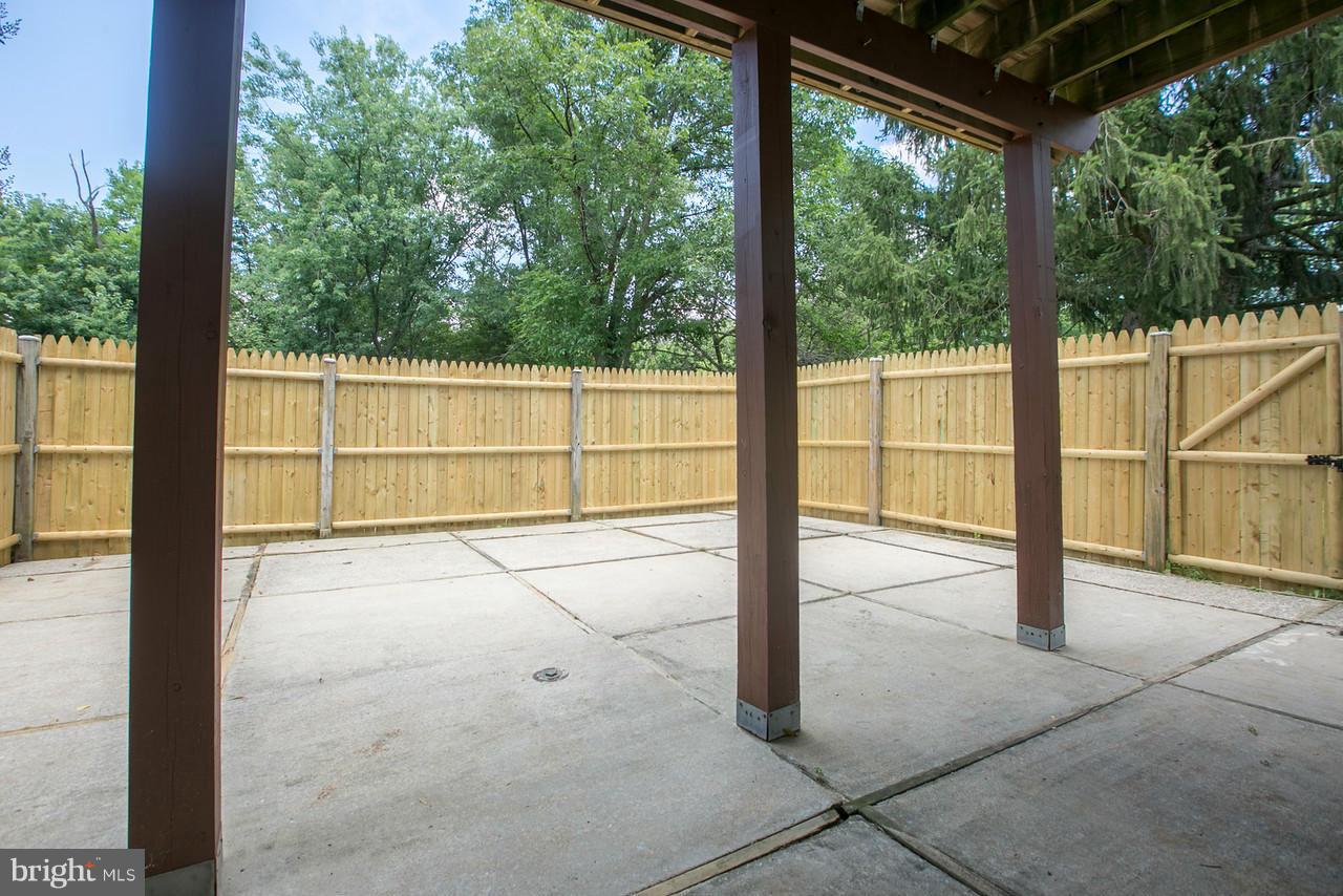 1668 Colonial Way Frederick, MD 21702 - Photo 22 of 26 Patio under deck. Fully fenced backyard