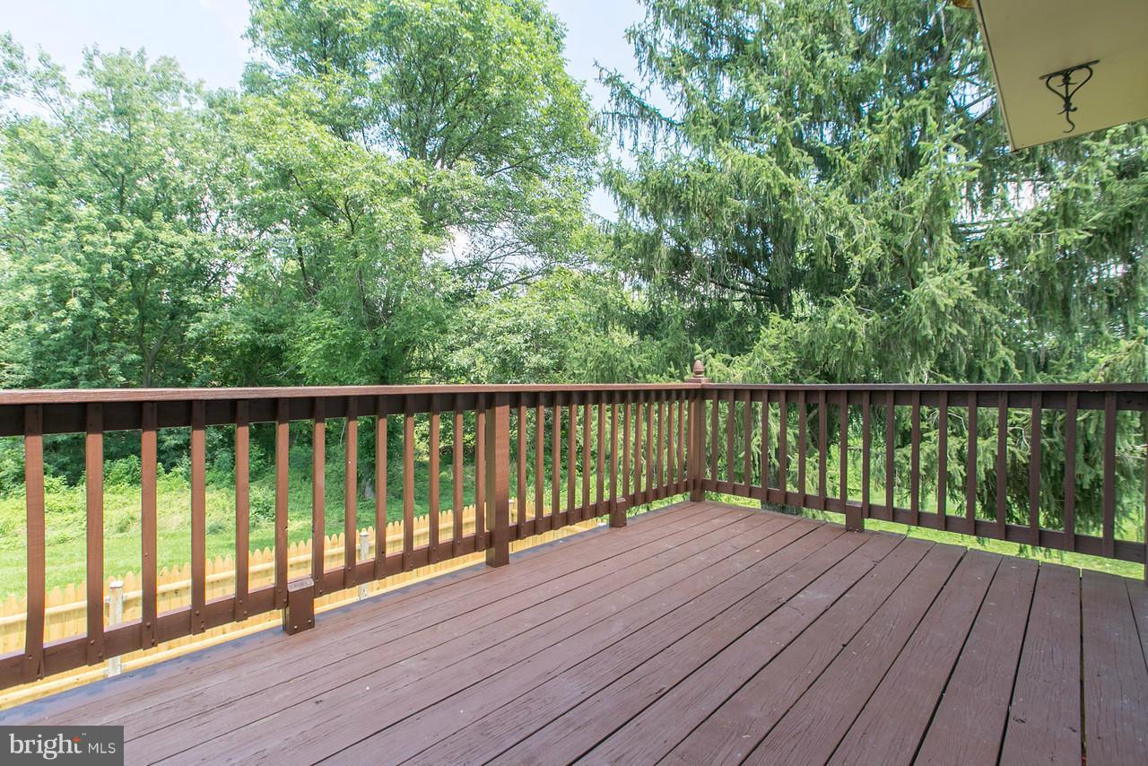 1668 Colonial Way Frederick, MD 21702 - Photo 8 of 26 Spacious deck backing to woods