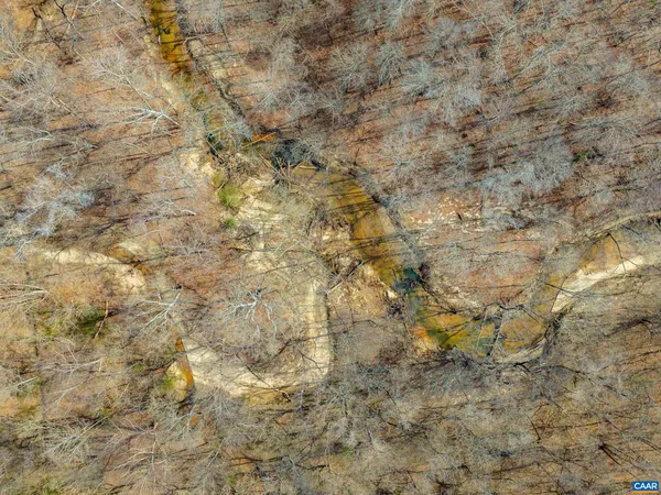 a view of a beach with a ocean view