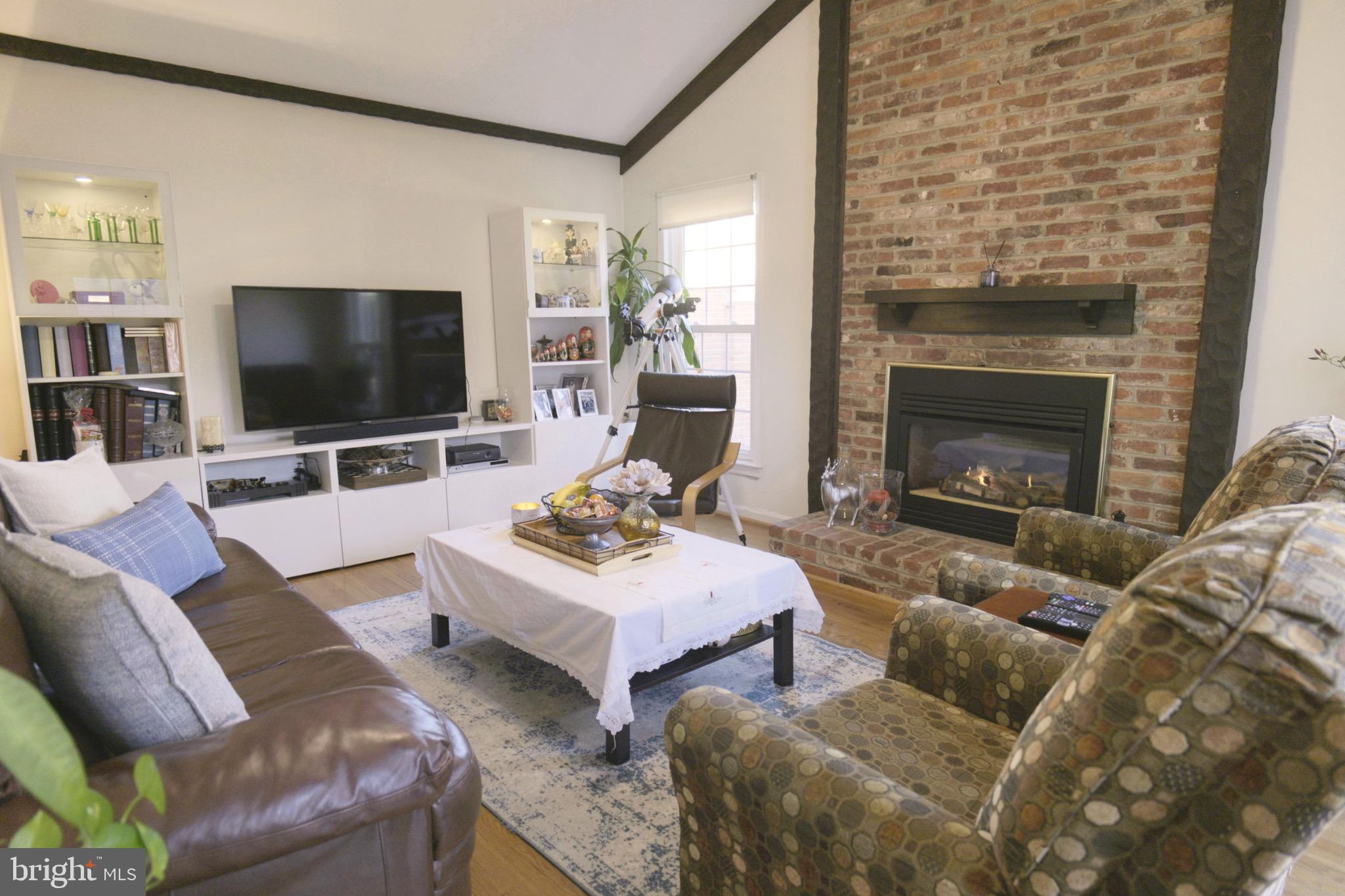 10277 Gainsborough Road Potomac, MD 20854 - Photo 10 of 31 Cozy Family room with gas fireplace