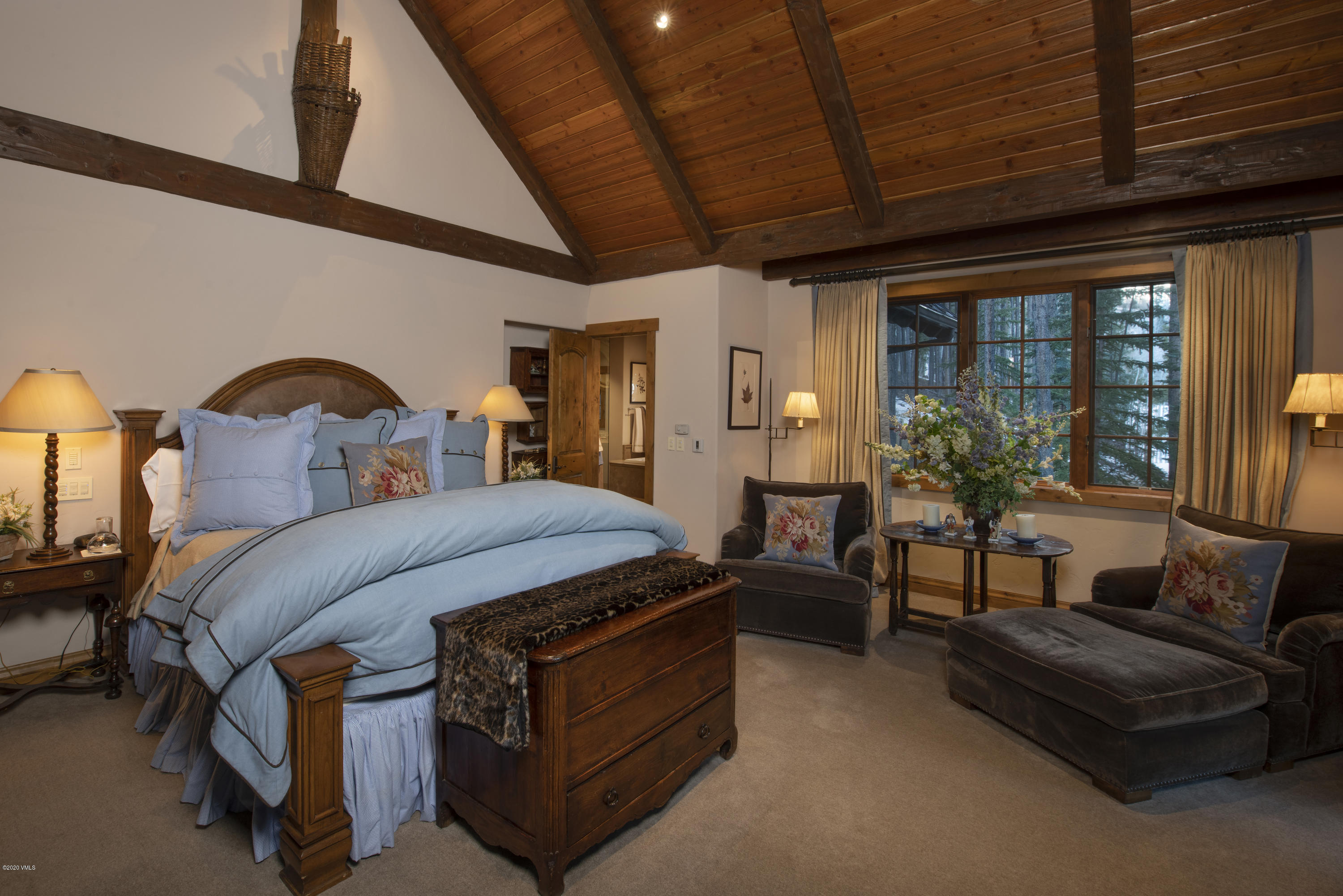2916 Daybreak Ridge Road Avon, CO 81620 - Photo 10 of 15 a bedroom with furniture and a window