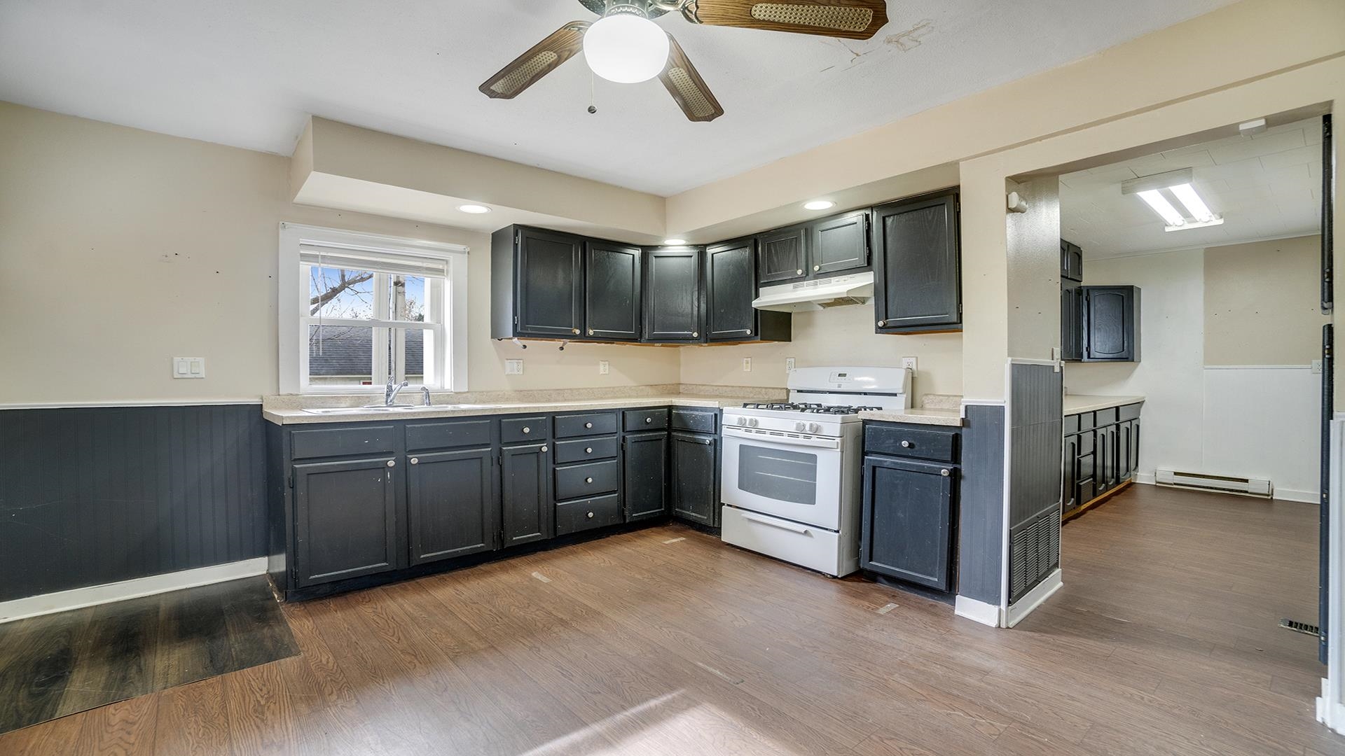 201 West Center Street Mount Morris, IL 61054 - Photo 11 of 33 a kitchen with stainless steel appliances granite countertop a stove a sink and a refrigerator