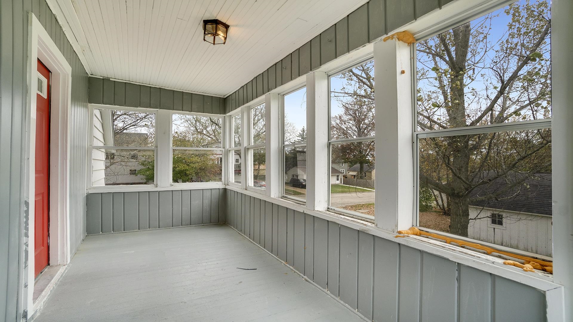 201 West Center Street Mount Morris, IL 61054 - Photo 27 of 33 wooden floor in an empty room with a window