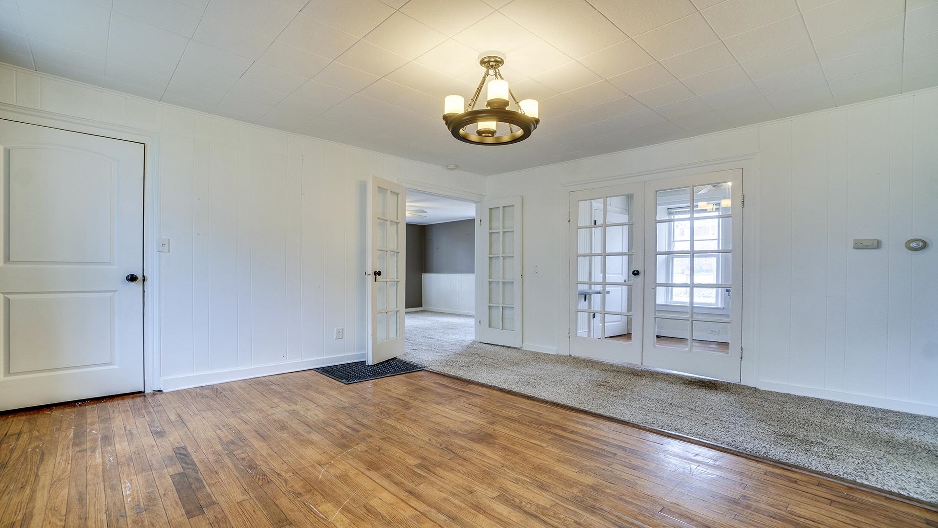 201 West Center Street Mount Morris, IL 61054 - Photo 8 of 33 wooden floor in an empty room with a window