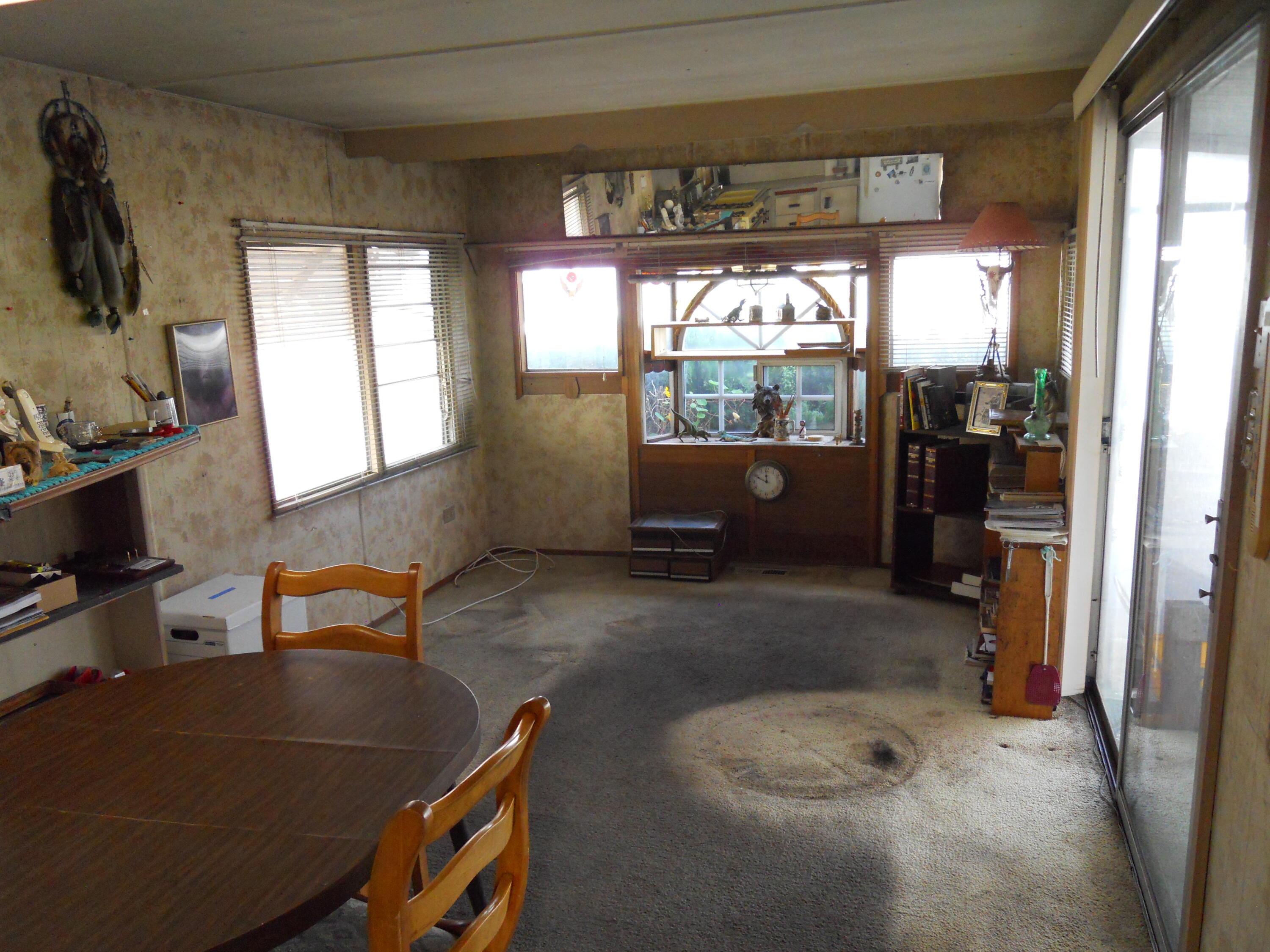 520 Pine Avenue, Unit 25 Goleta, CA 93117 - Photo 4 of 9 a room with furniture and a window