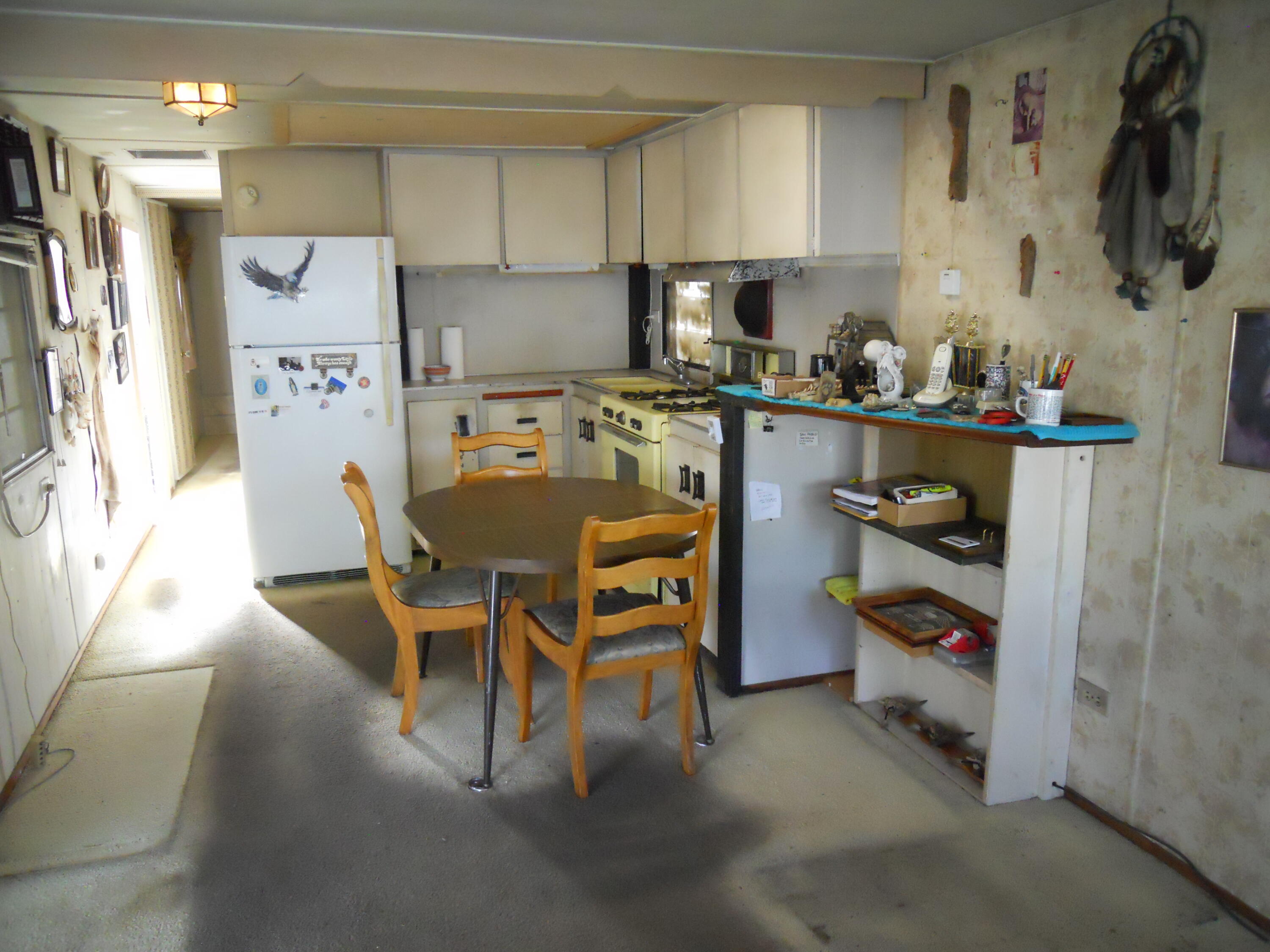 520 Pine Avenue, Unit 25 Goleta, CA 93117 - Photo 6 of 9 a kitchen with stainless steel appliances a refrigerator and a stove top oven