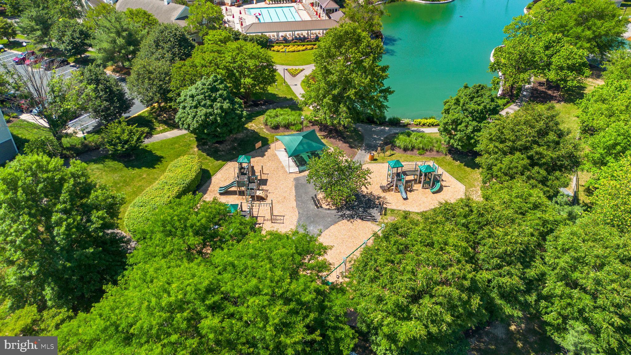 2444 Blue Spring Court, Unit 203 Odenton, MD 21113 - Photo 35 of 36 an aerial view of residential house with outdoor space and trees all around