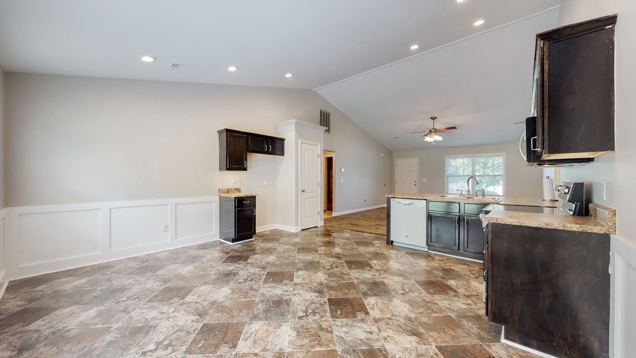 6025 Chickadee Circle Spring Hill, TN 37174 - Photo 12 of 44 a kitchen with stainless steel appliances a refrigerator and a stove top oven