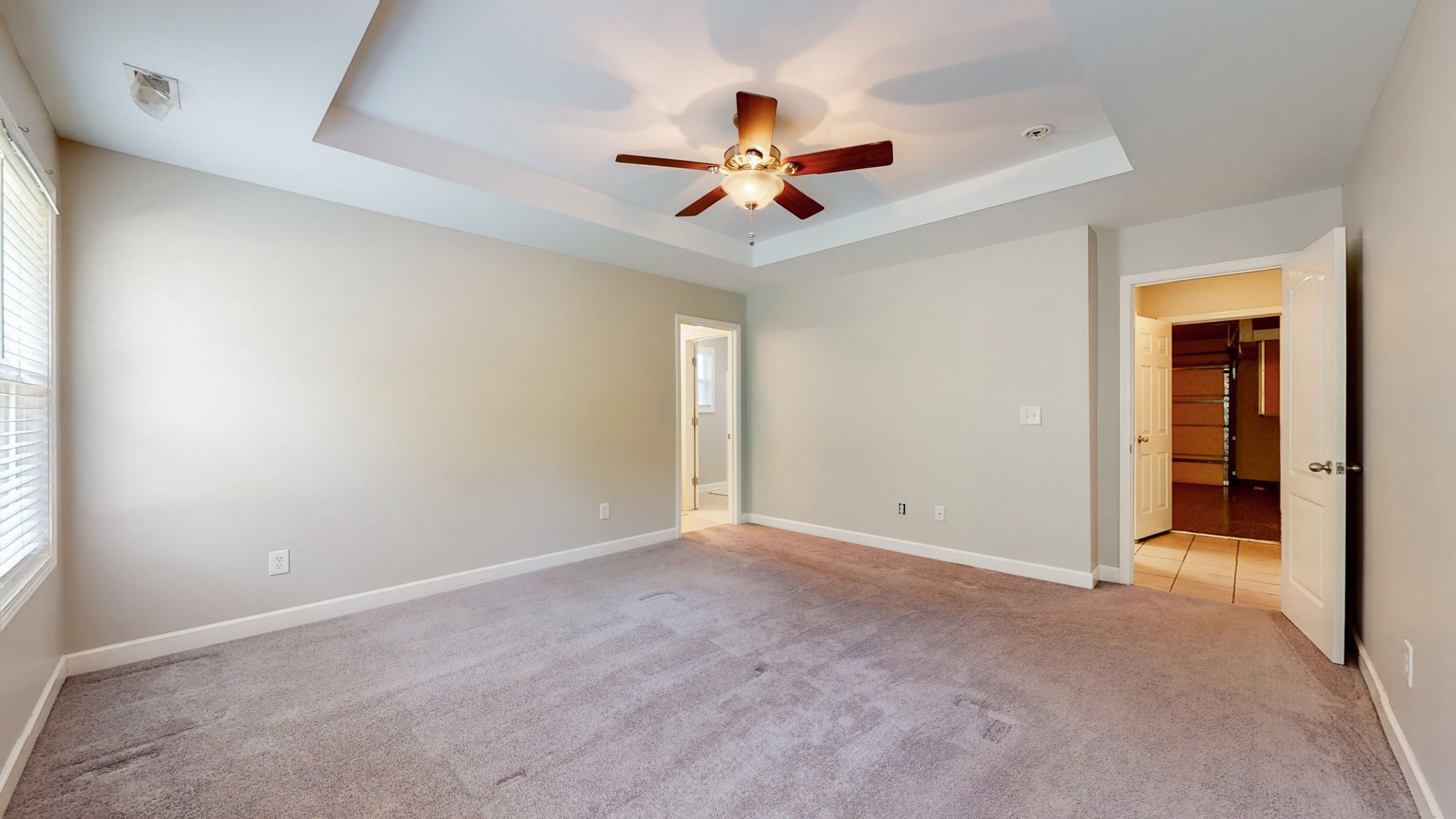 6025 Chickadee Circle Spring Hill, TN 37174 - Photo 14 of 44 an empty room with closet and a ceiling fan