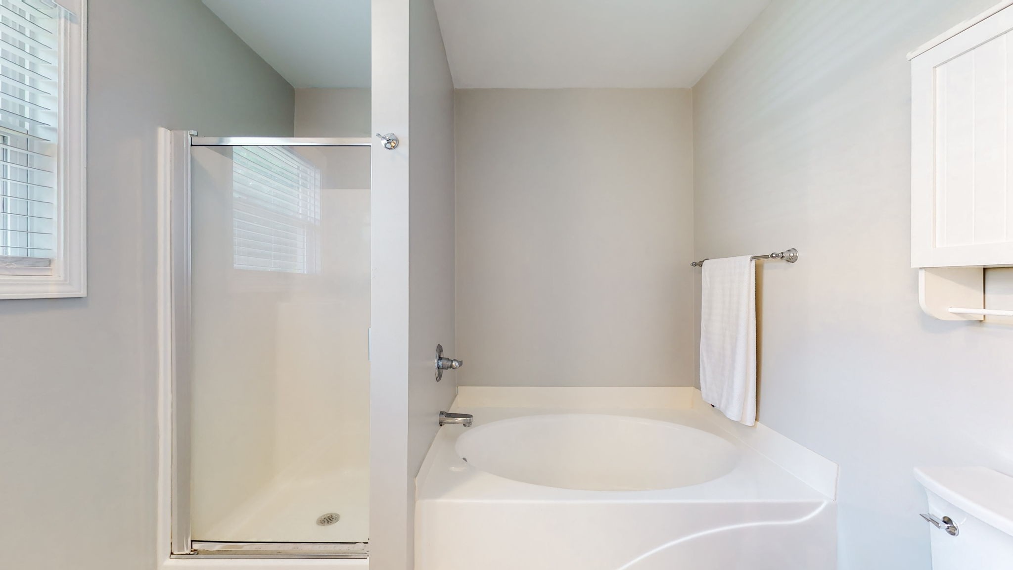 6025 Chickadee Circle Spring Hill, TN 37174 - Photo 18 of 44 a white bath tub sitting next to a white cabinet