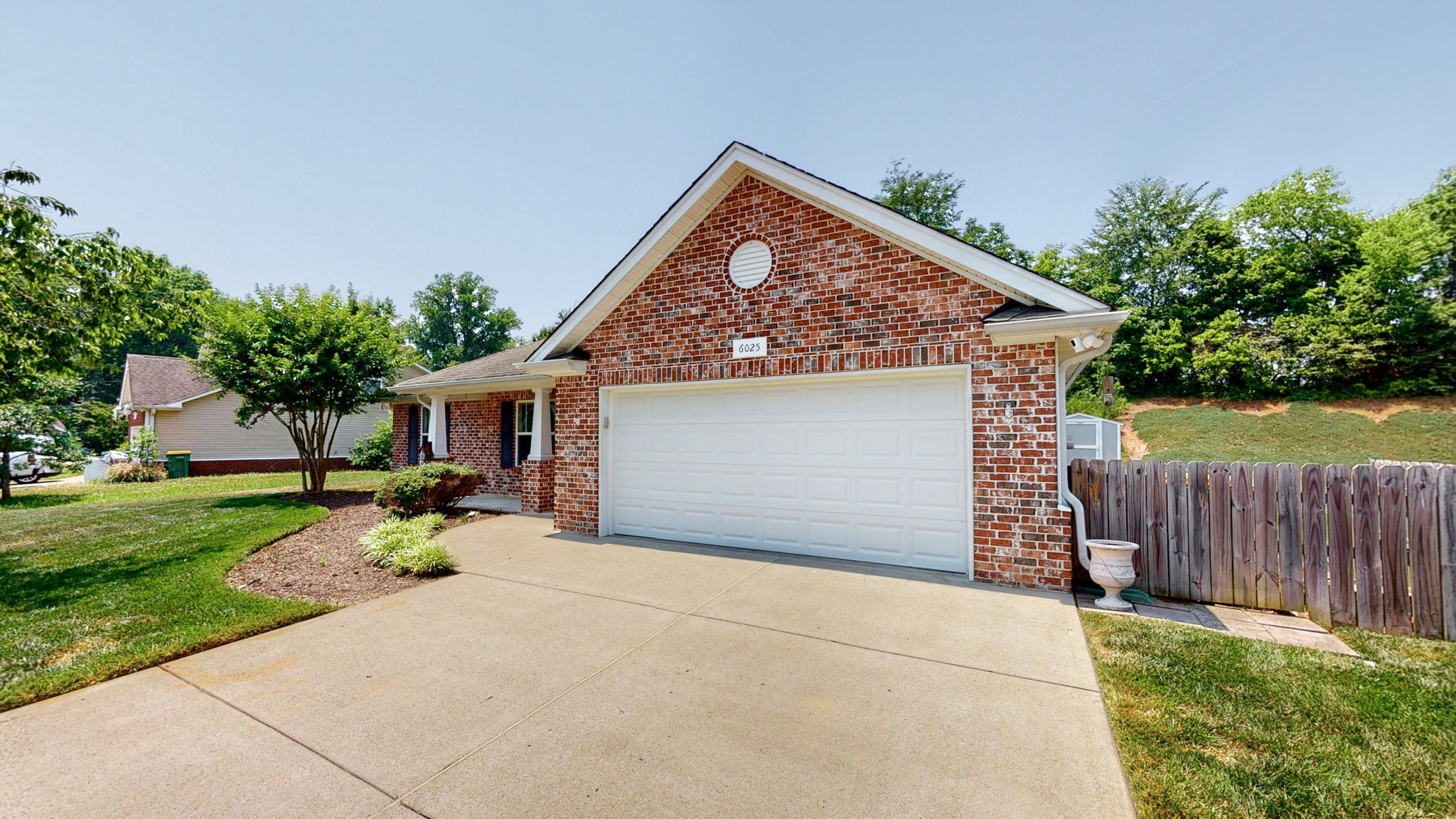 6025 Chickadee Circle Spring Hill, TN 37174 - Photo 2 of 44 front view of a house with a yard