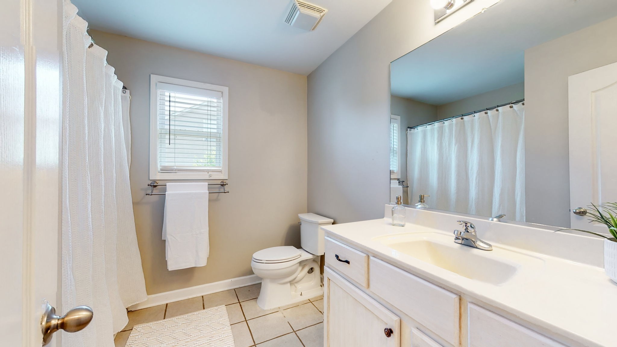 6025 Chickadee Circle Spring Hill, TN 37174 - Photo 23 of 44 a bathroom with a granite countertop sink toilet and shower