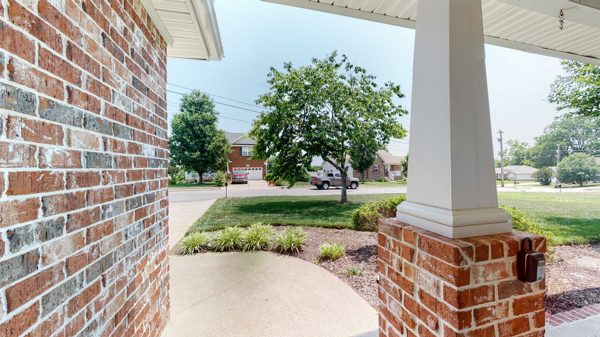 6025 Chickadee Circle Spring Hill, TN 37174 - Photo 3 of 44 a front view of a house with a yard
