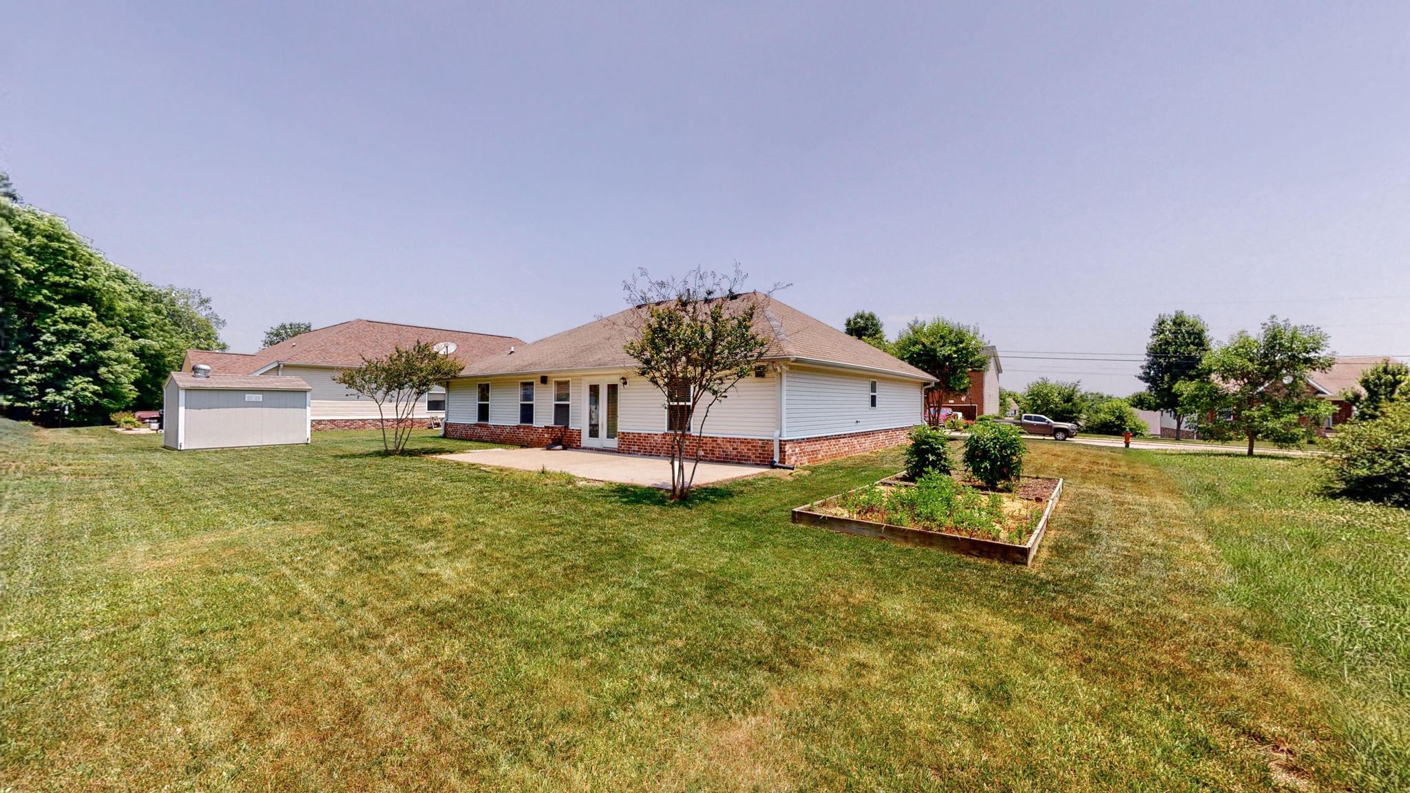 6025 Chickadee Circle Spring Hill, TN 37174 - Photo 32 of 44 a view of a house with a yard porch and sitting area