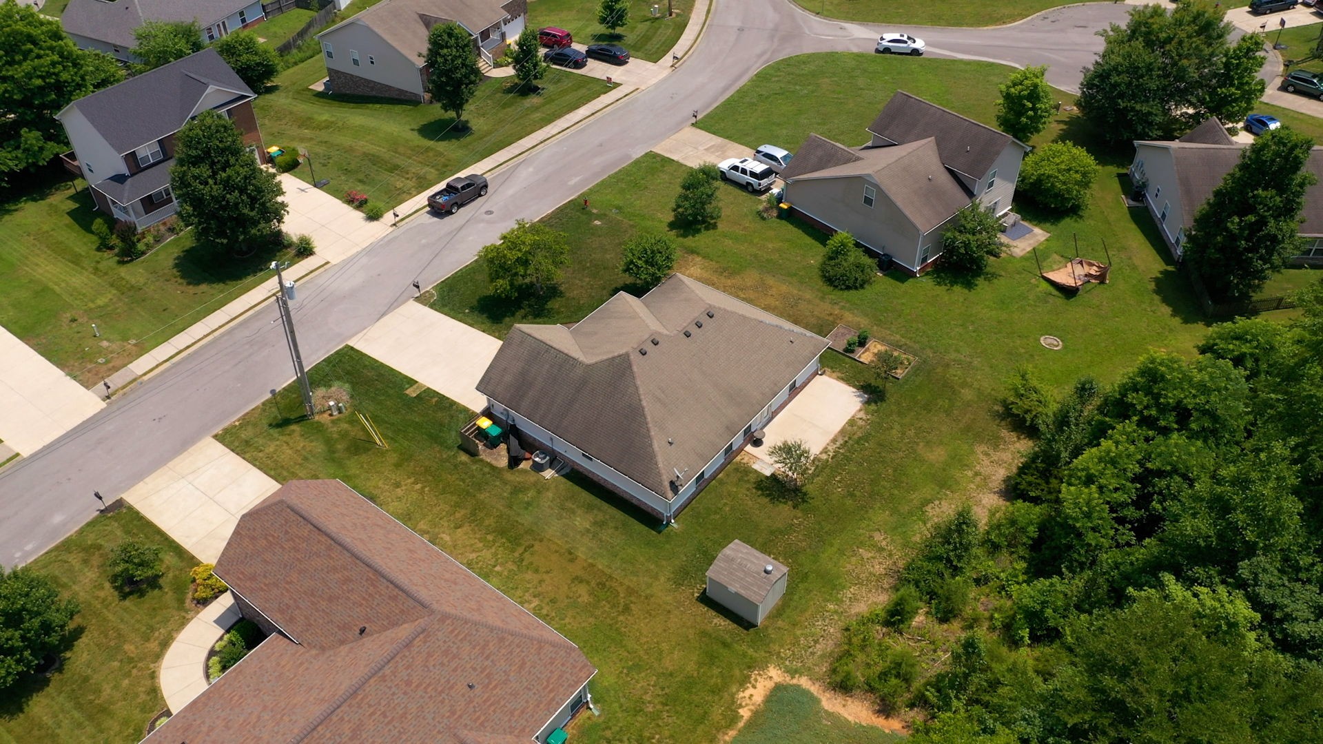6025 Chickadee Circle Spring Hill, TN 37174 - Photo 40 of 44 an aerial view of a house with garden space and street view