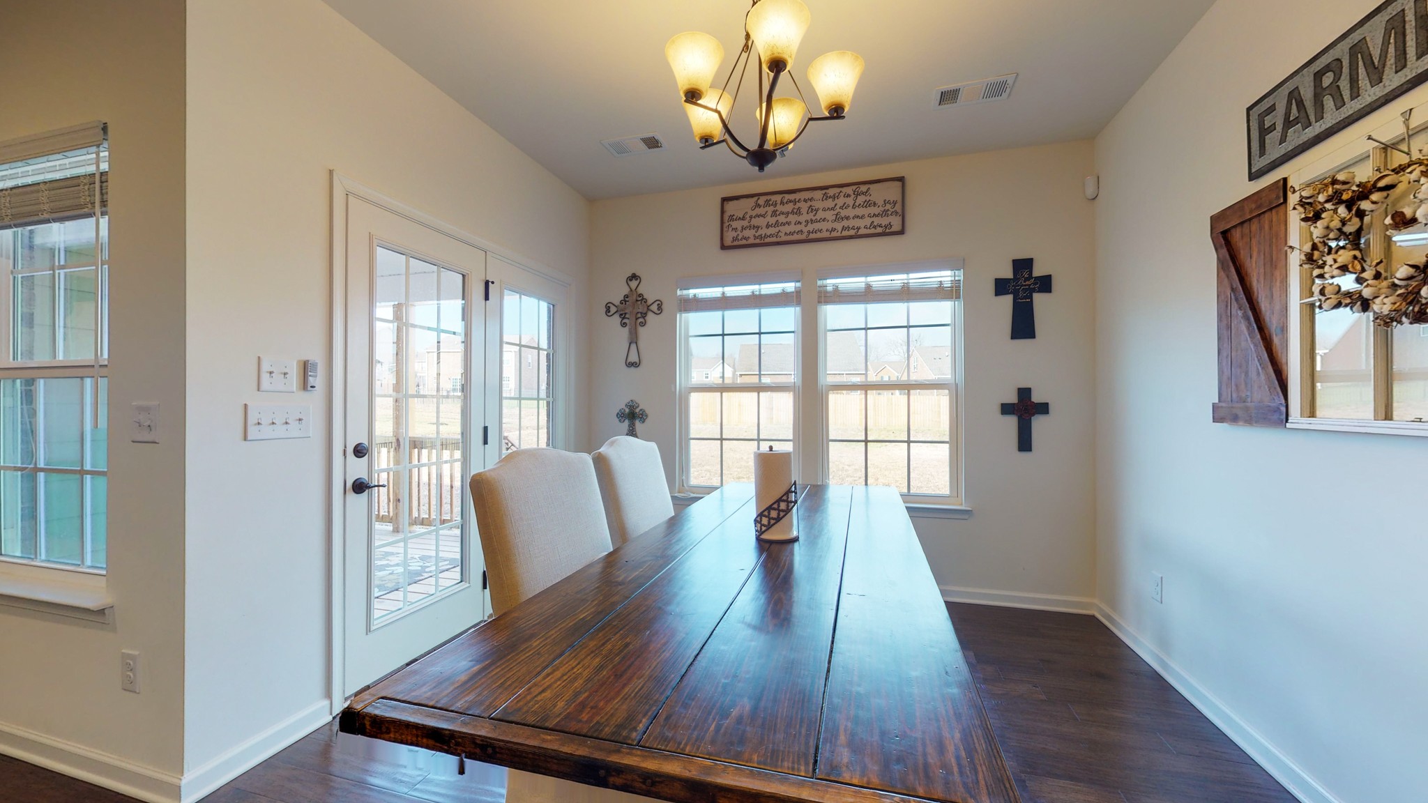 132 Hackney Lane Gallatin, TN 37066 - Photo 14 of 40 a view of a livingroom with furniture wooden floor and chandelier