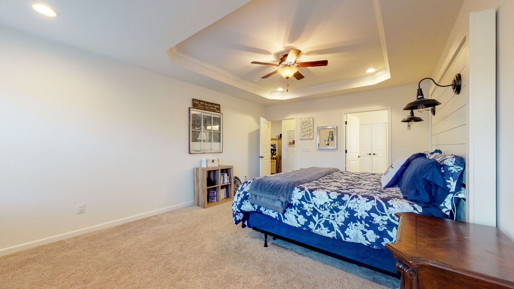 132 Hackney Lane Gallatin, TN 37066 - Photo 18 of 40 a bedroom with a bed and a chandelier