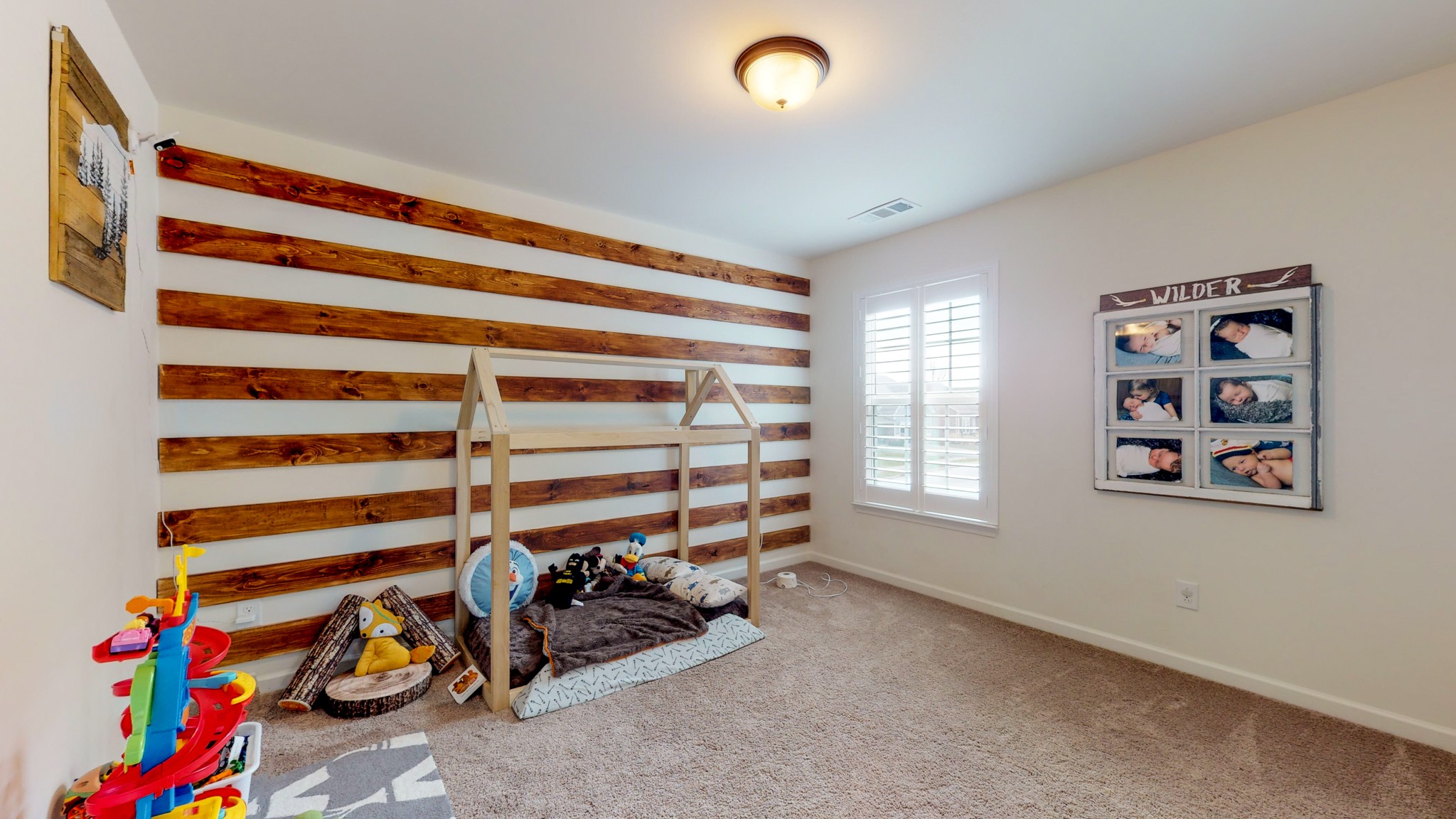 132 Hackney Lane Gallatin, TN 37066 - Photo 26 of 40 a view of a livingroom with toys and a window