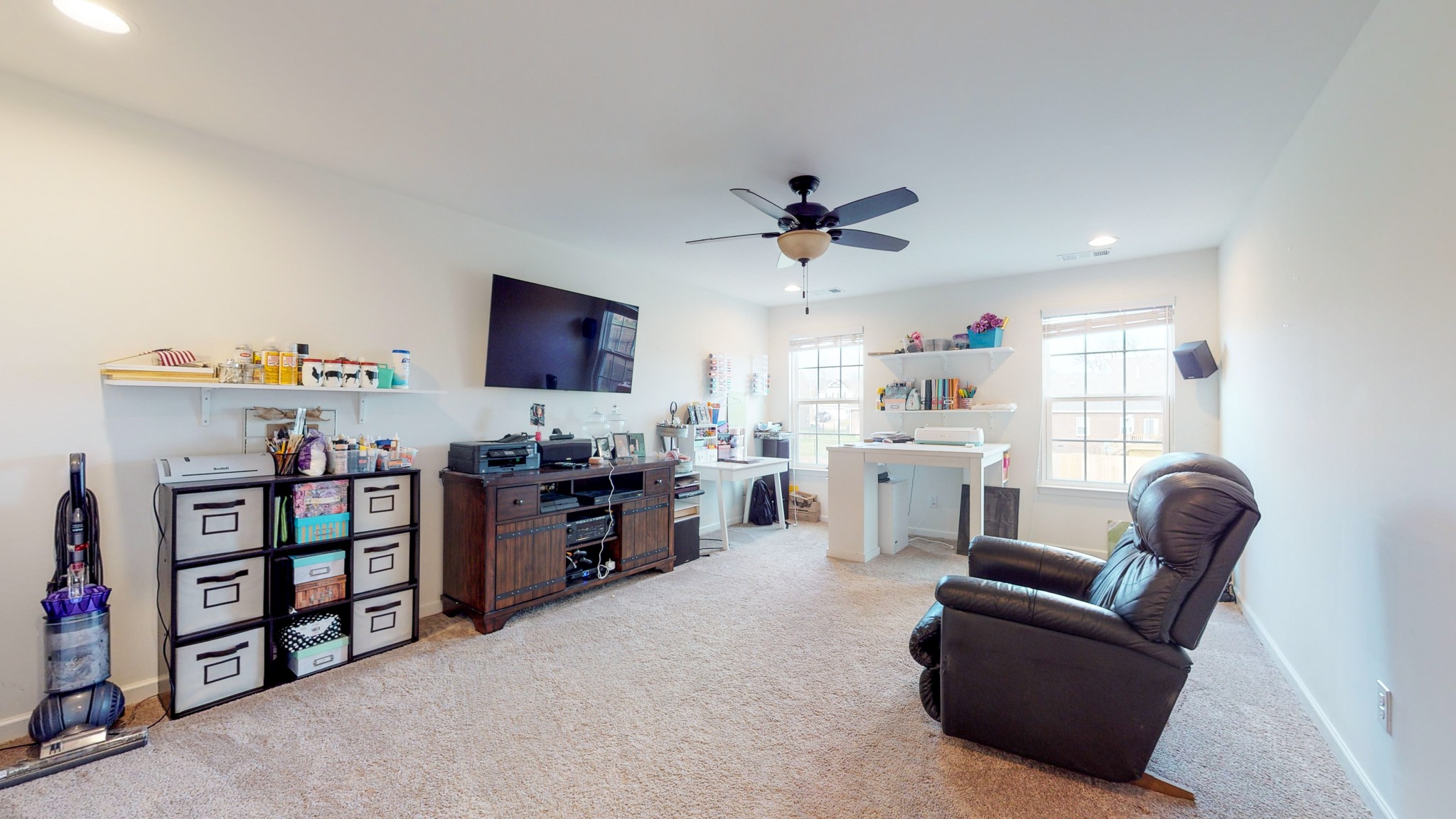 132 Hackney Lane Gallatin, TN 37066 - Photo 29 of 40 a living room with furniture a window and a flat screen tv