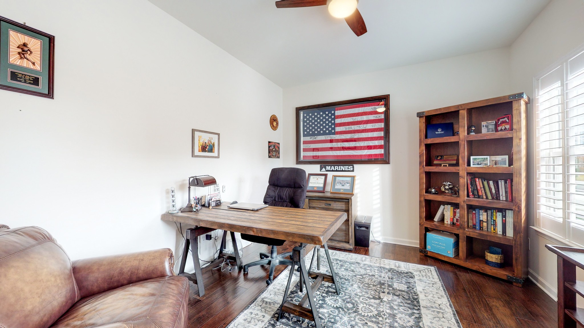 132 Hackney Lane Gallatin, TN 37066 - Photo 4 of 40 a work room with furniture and a book shelf
