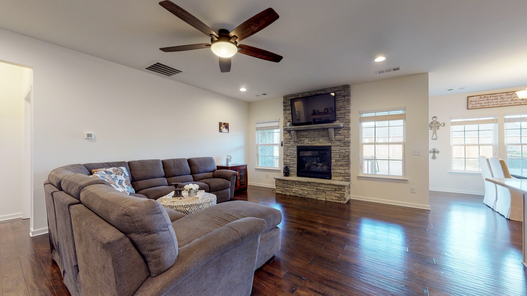 132 Hackney Lane Gallatin, TN 37066 - Photo 5 of 40 a living room with furniture a fireplace and wooden floor