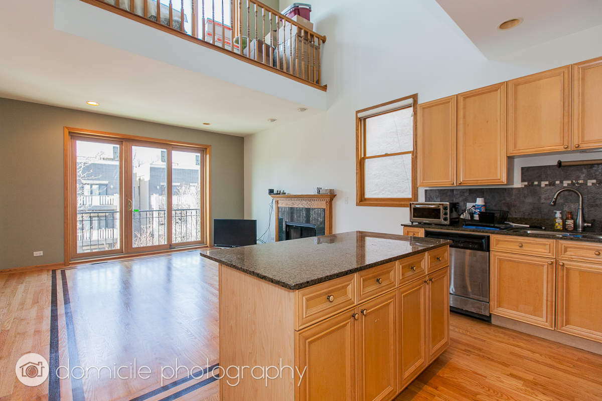 Undisclosed Address Chicago, IL 60618 - Photo 4 of 20 a kitchen with stainless steel appliances granite countertop a stove a sink and a refrigerator