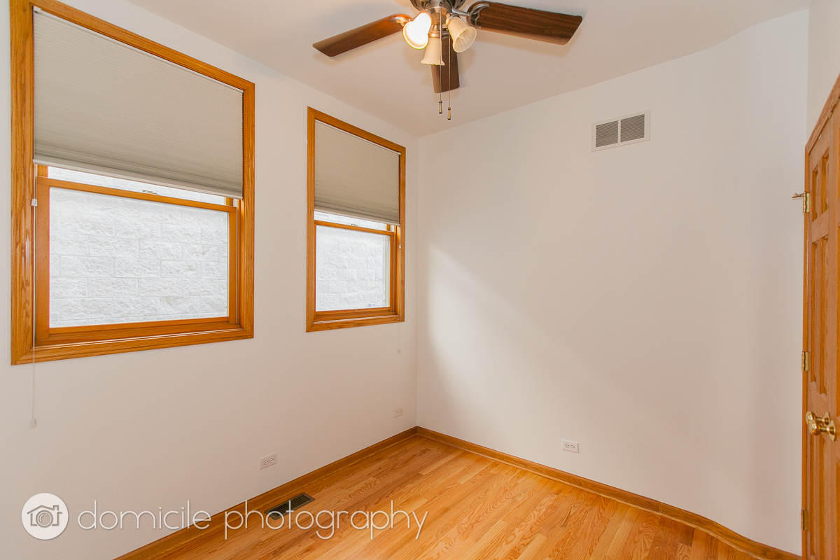 Undisclosed Address Chicago, IL 60618 - Photo 7 of 20 a view of an empty room with a window