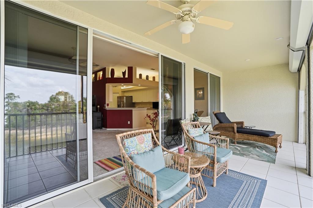 10871 Crooked River Road, Unit 202 Estero, FL 34135 - Photo 19 of 46 a outdoor space with furniture