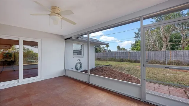 a view of backyard with tub