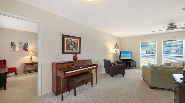 a living room with furniture and a window