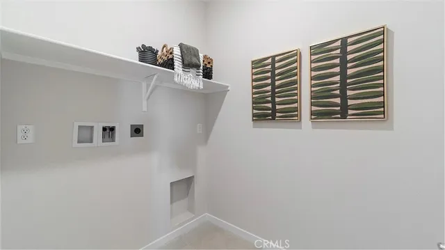 a view of kitchen and utility room