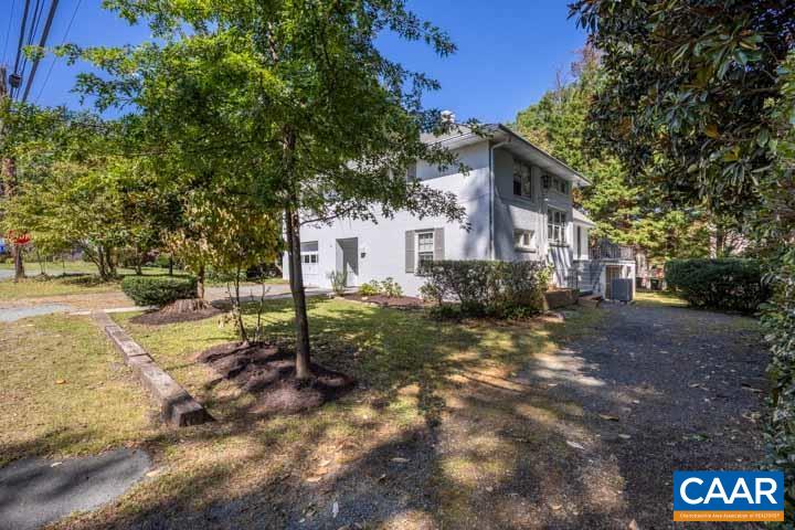 212 Alderman Road Charlottesville, VA 22903 - Photo 49 of 62 a view of a yard with plants and trees