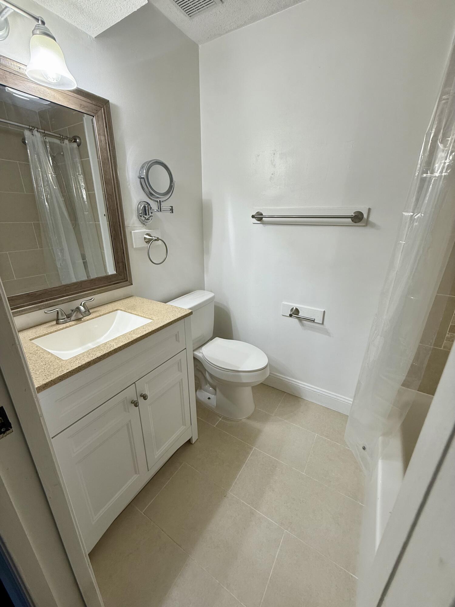 6030 Indrio Road, Unit 5 Fort Pierce, FL 34951 - Photo 5 of 21 IMG_2498
