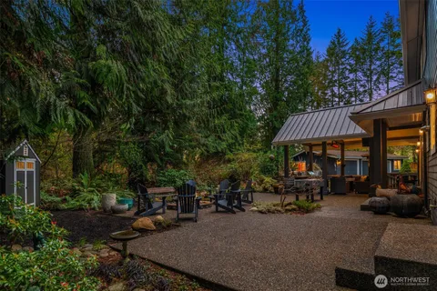 a view of a chairs and table in a patio