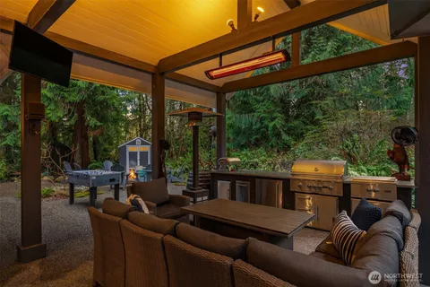 a view of a chairs and table in a patio
