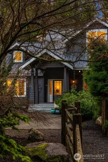 a front view of a house with a porch