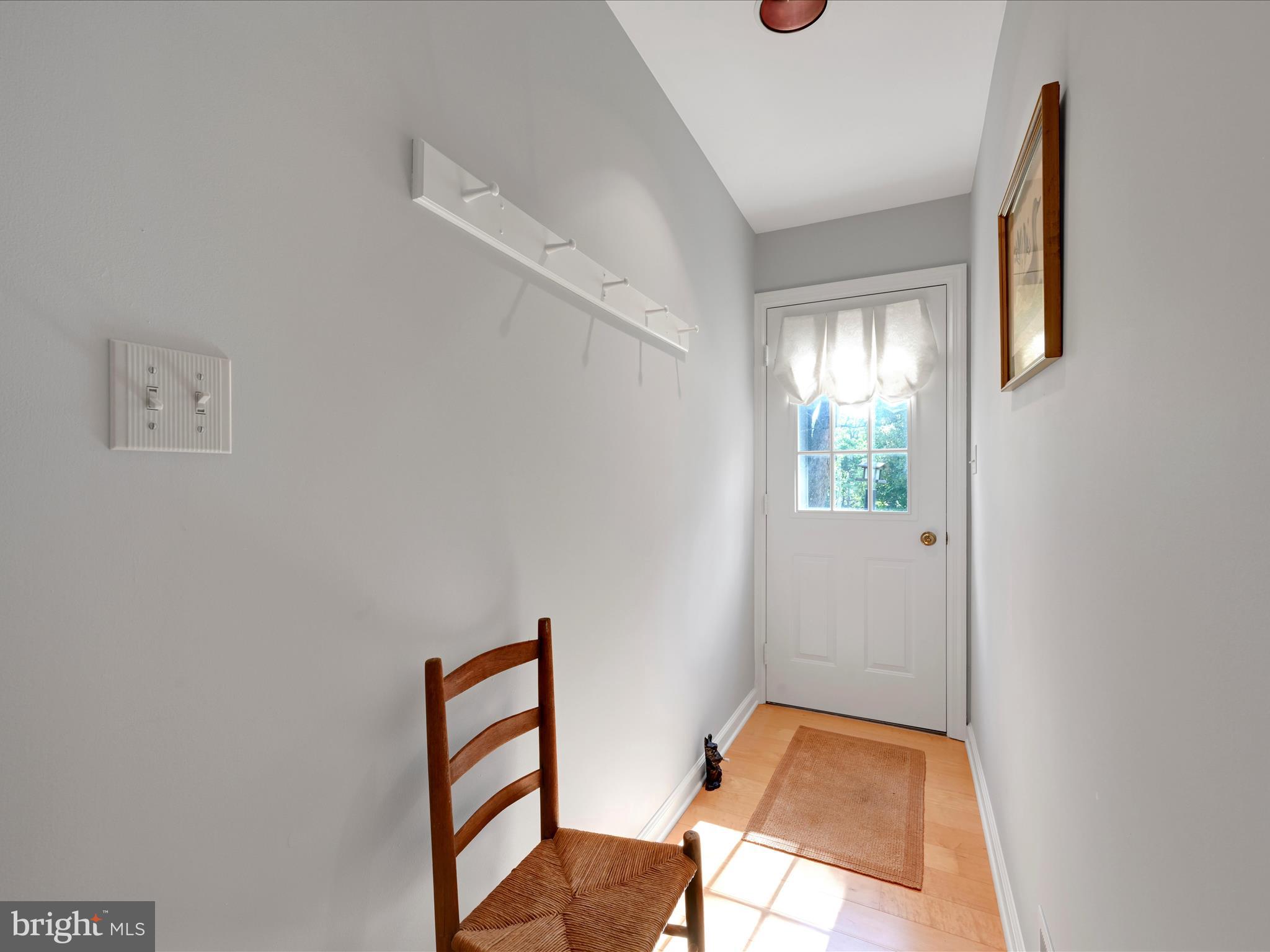 475 Sand Hill Road Pequea, PA 17565 - Photo 21 of 54 a view of an entryway with wooden floor and a window