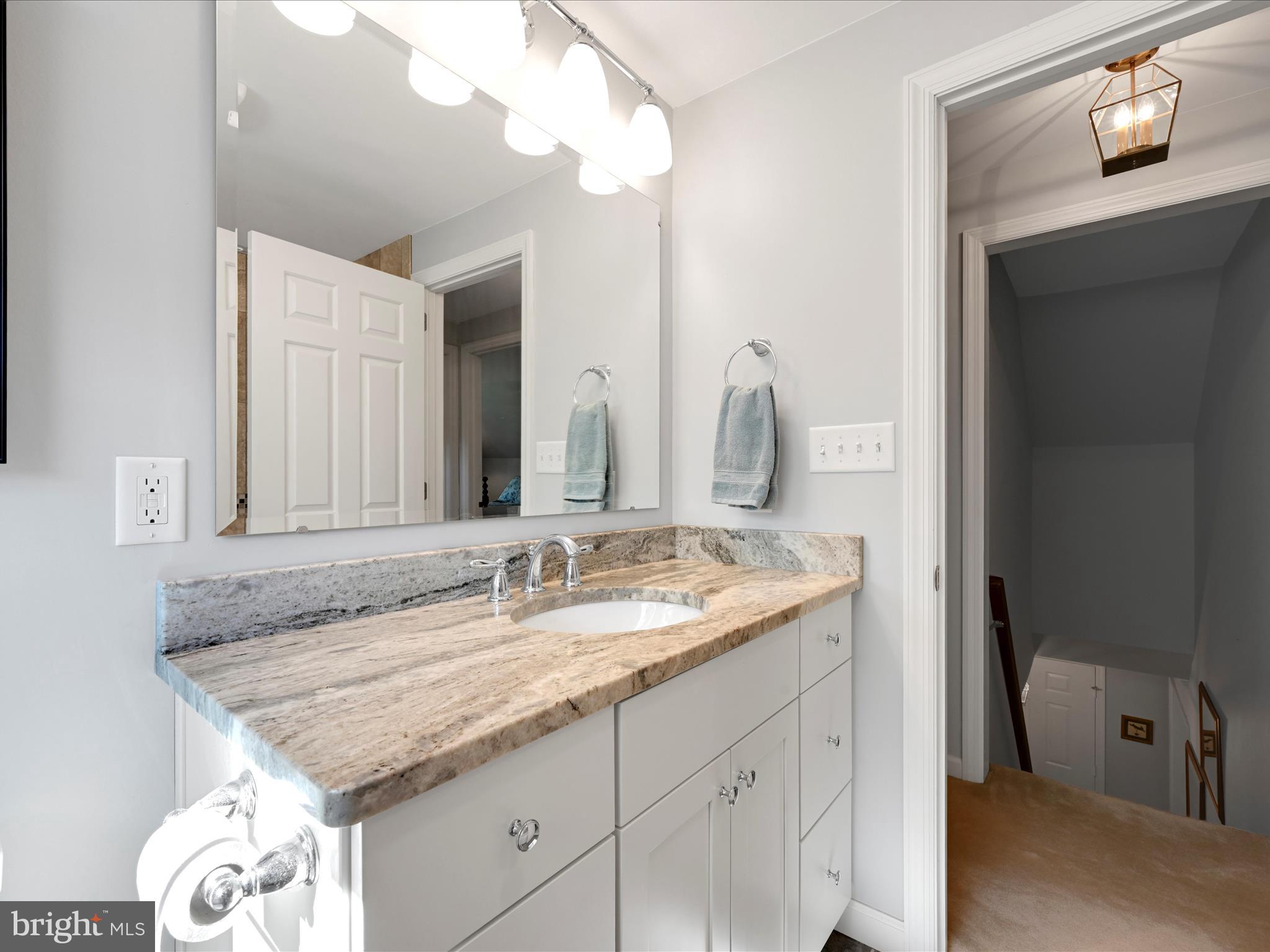 475 Sand Hill Road Pequea, PA 17565 - Photo 28 of 54 a bathroom with a granite countertop sink and a mirror