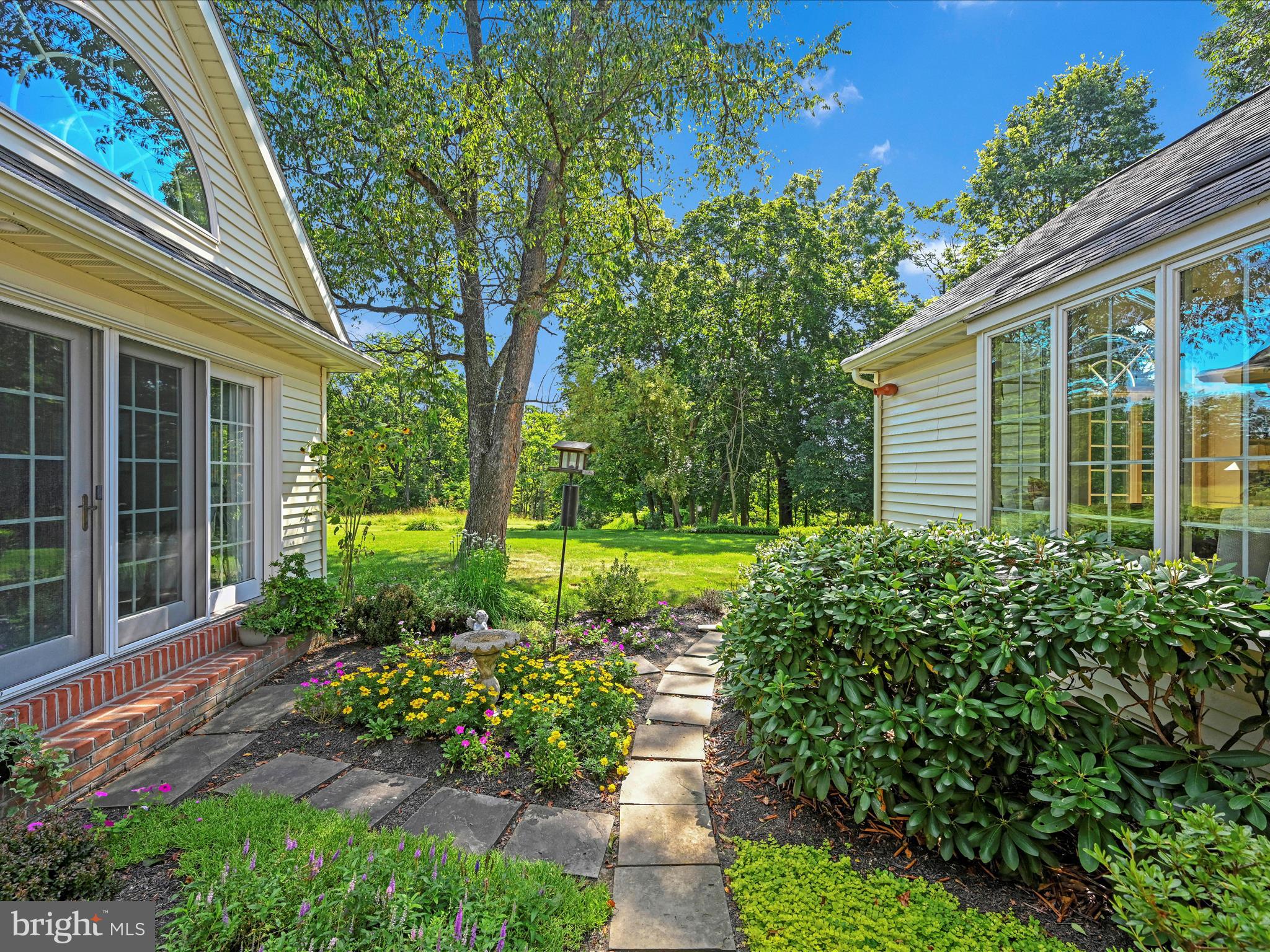 475 Sand Hill Road Pequea, PA 17565 - Photo 40 of 54 a view of a house with a garden