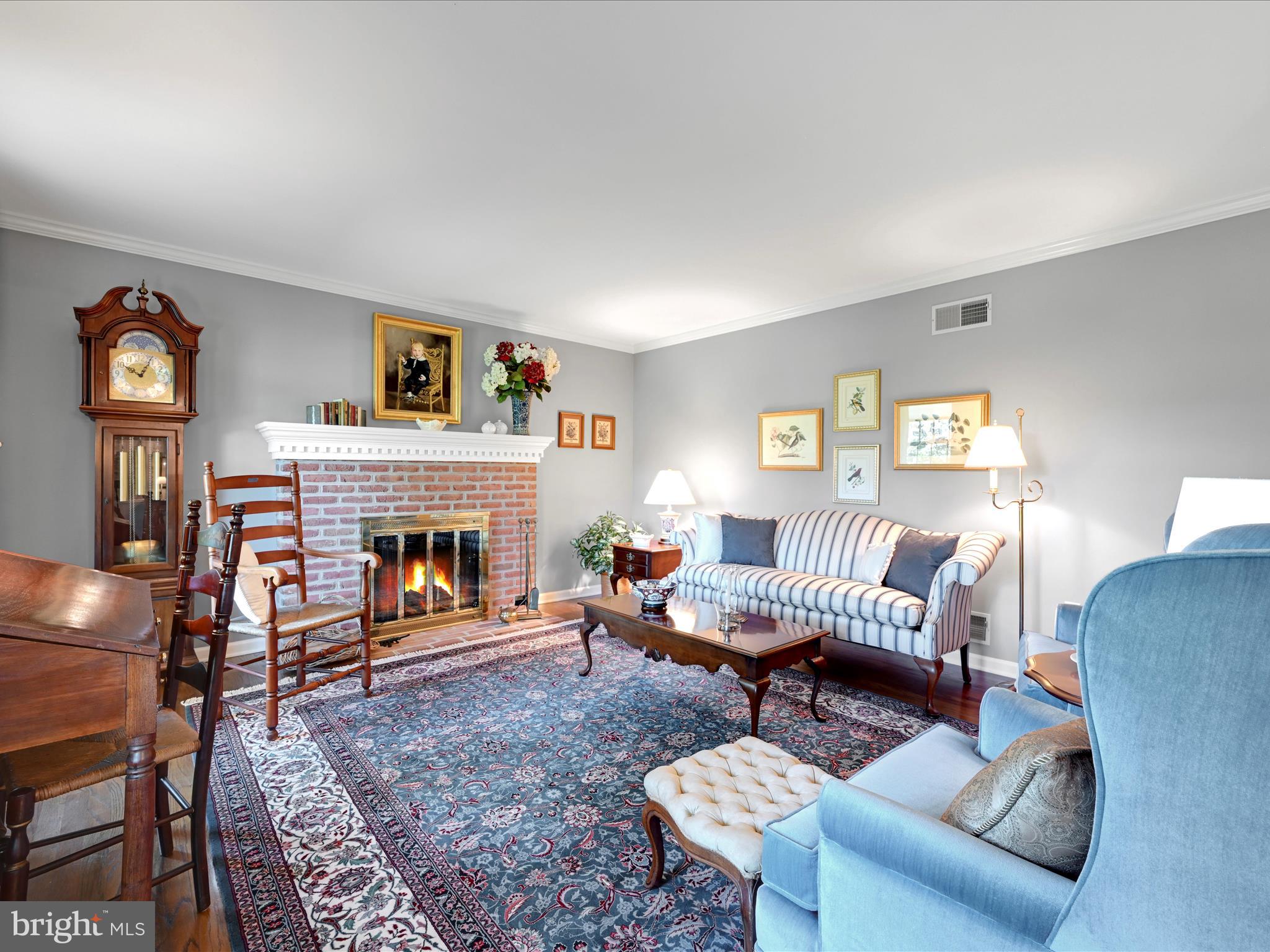 475 Sand Hill Road Pequea, PA 17565 - Photo 5 of 54 a living room with furniture and a fireplace