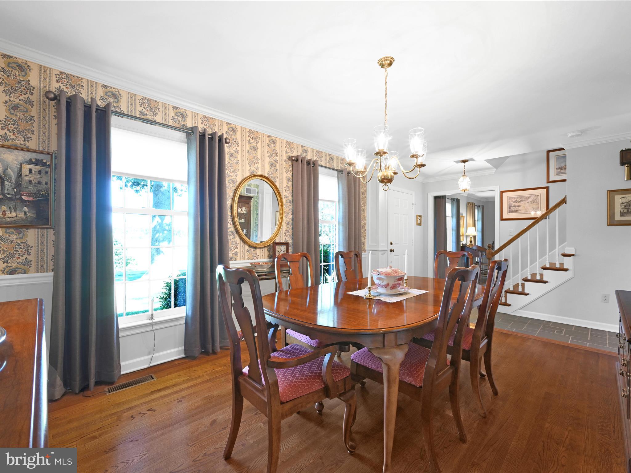 475 Sand Hill Road Pequea, PA 17565 - Photo 7 of 54 a dining room with furniture a chandelier and wooden floor