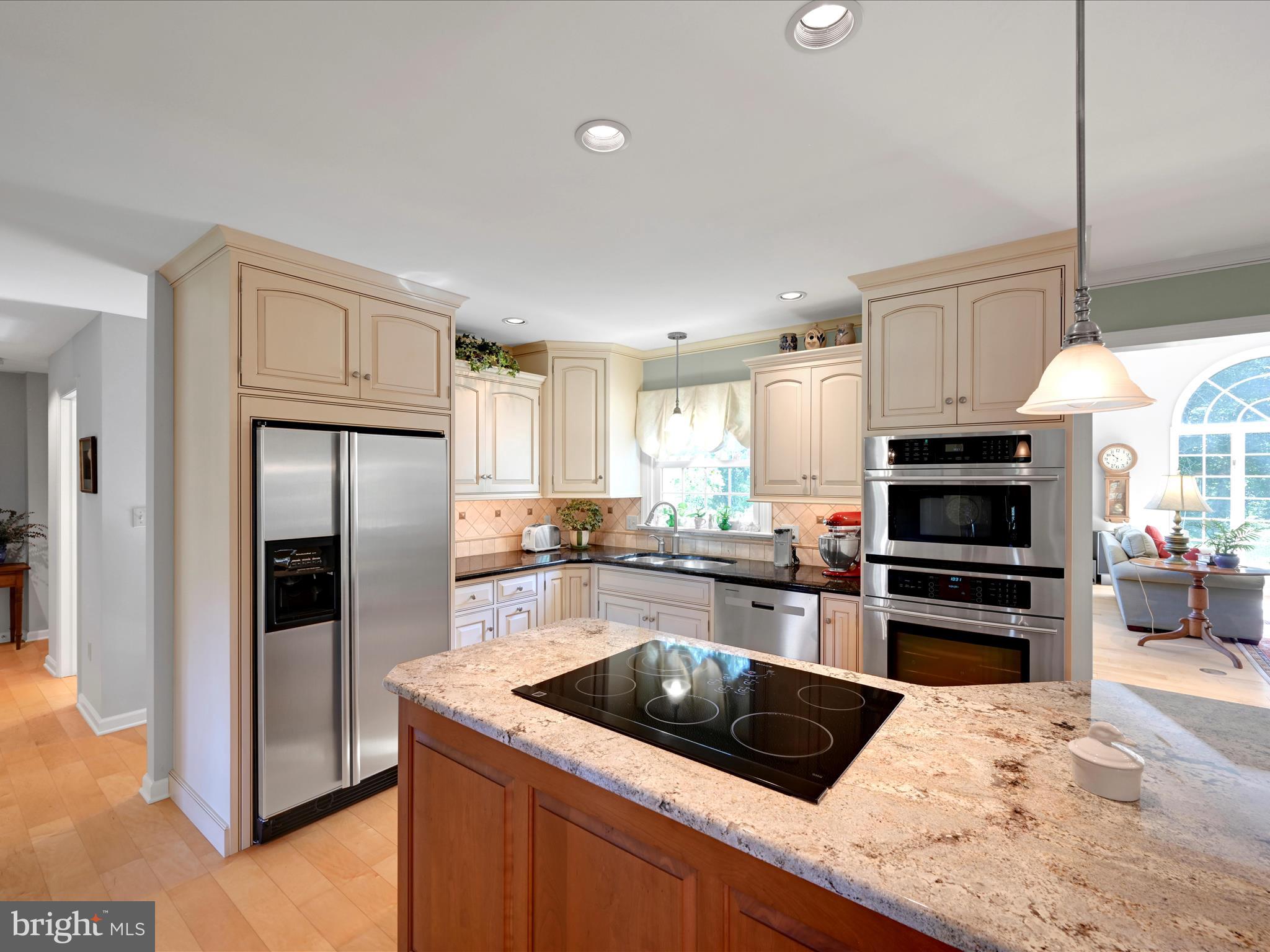 475 Sand Hill Road Pequea, PA 17565 - Photo 9 of 54 a kitchen with granite countertop a refrigerator oven a sink and dishwasher